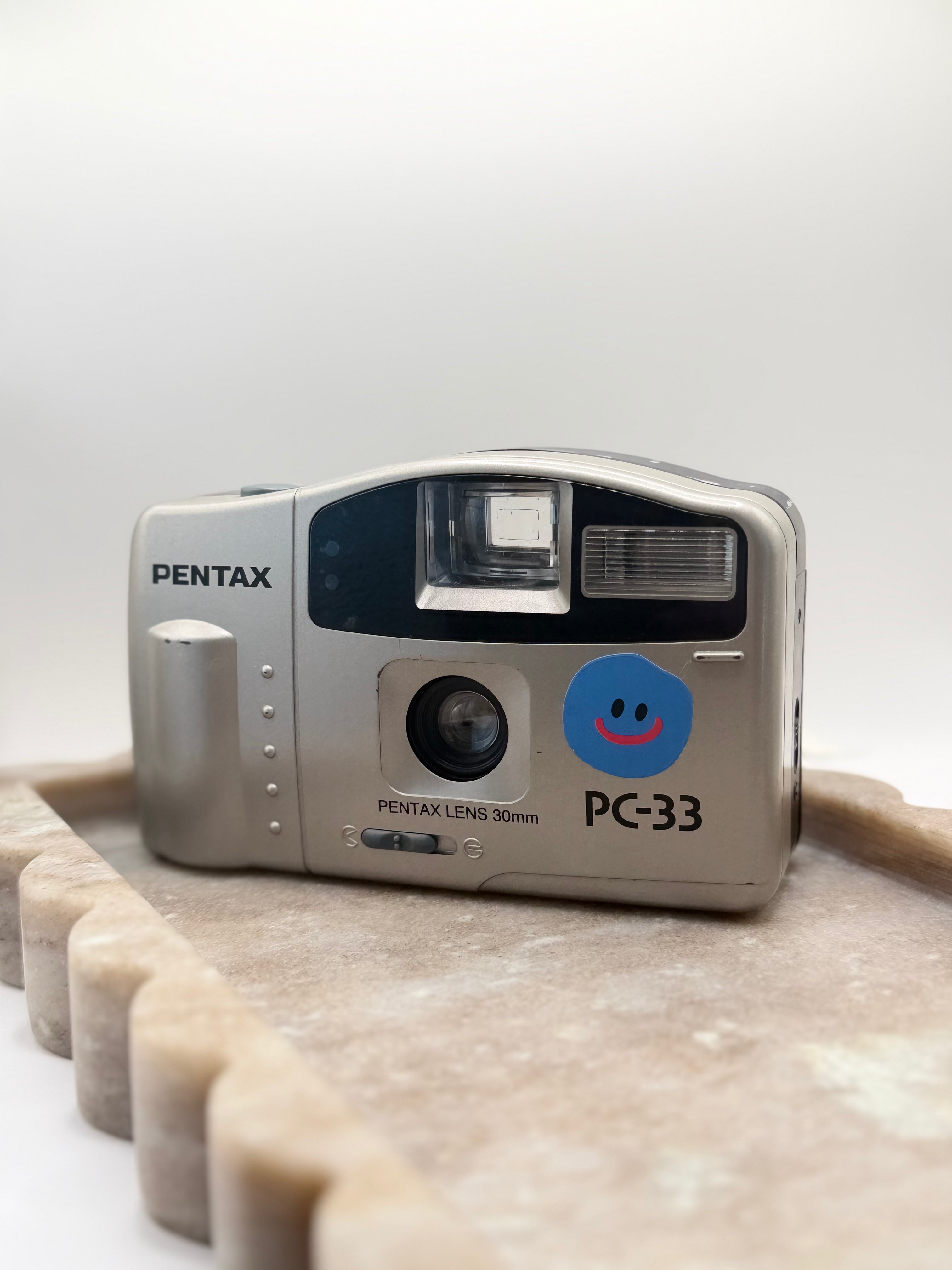 The Pentax PC-33 Silver Film Camera in Sliver